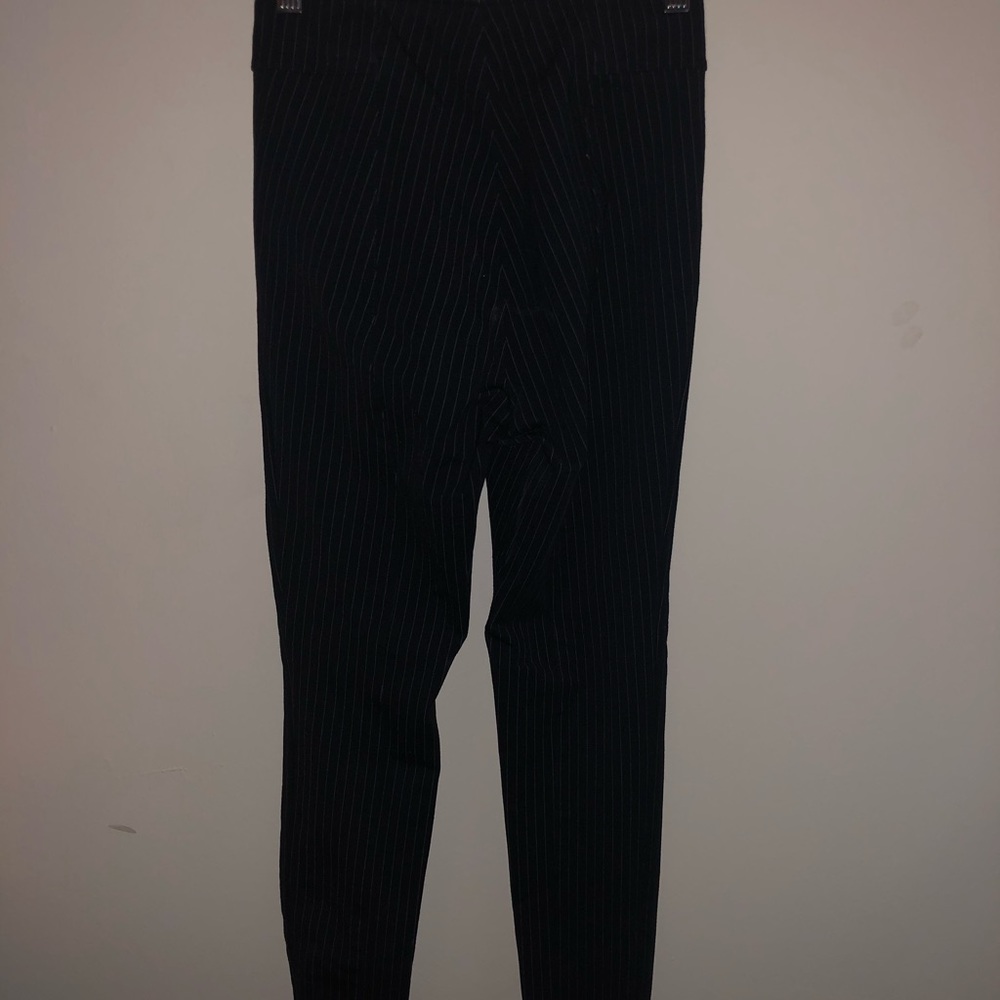 H&M Form fitting pinstripe slacks.